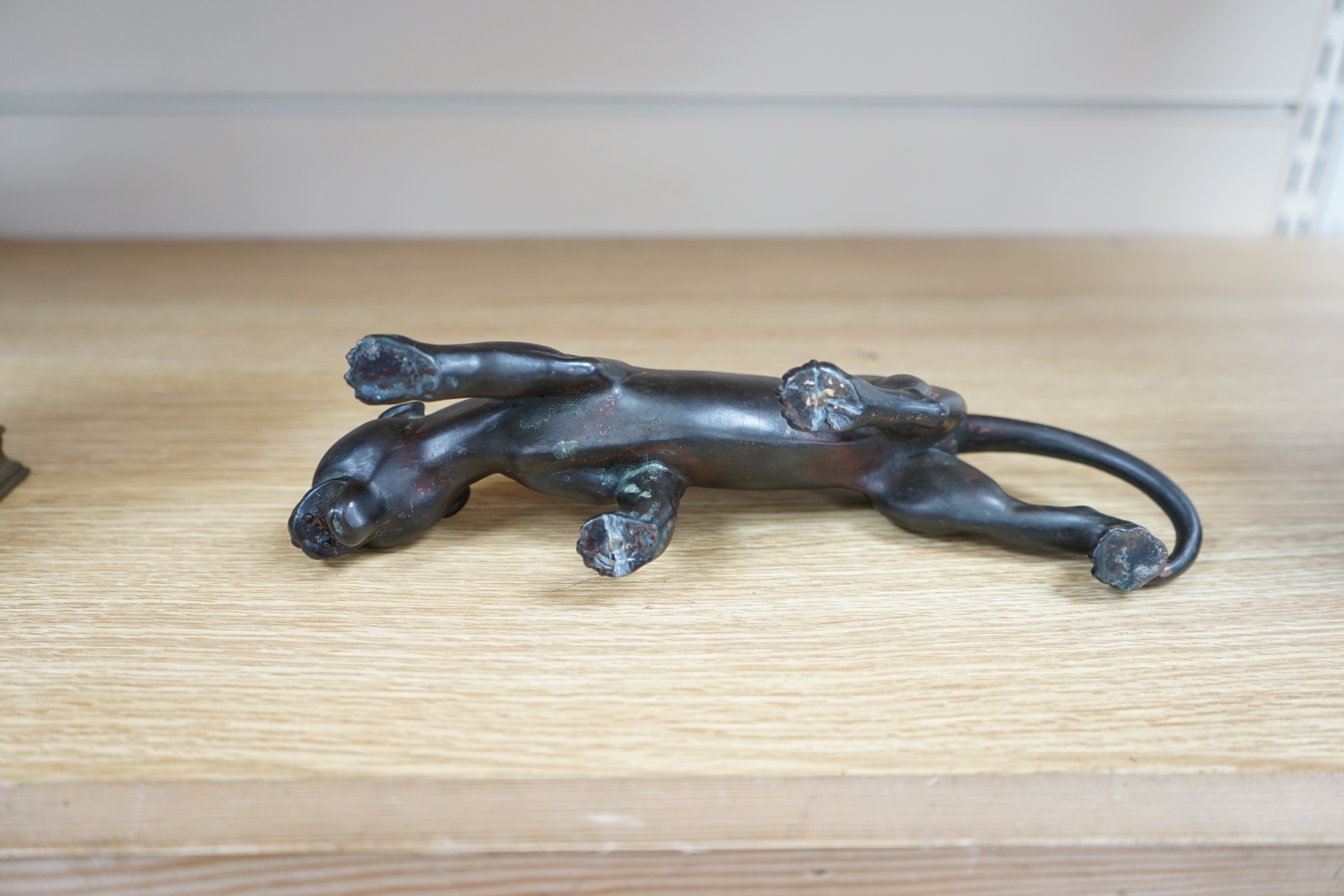 A small bronzed model of a Panther, 25cm long. Condition - some slight scuffing to surface